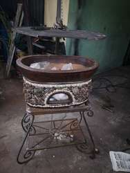 imagen de Asador de barro con parrilla levadiza _1