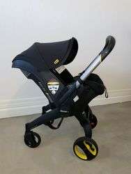 imagen de Doona All-in-One-Infant-Black-Car-Seat and Strolle_2