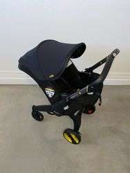 imagen de Doona All-in-One-Infant-Black-Car-Seat and Strolle_4